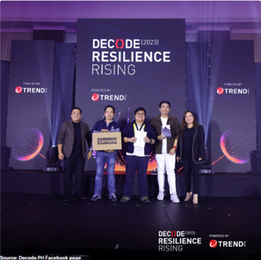 Omner Panzo (middle) wins an iPad 9th gen at Decode 2023 held at the EDSA Shangri-La on 14 November 2023